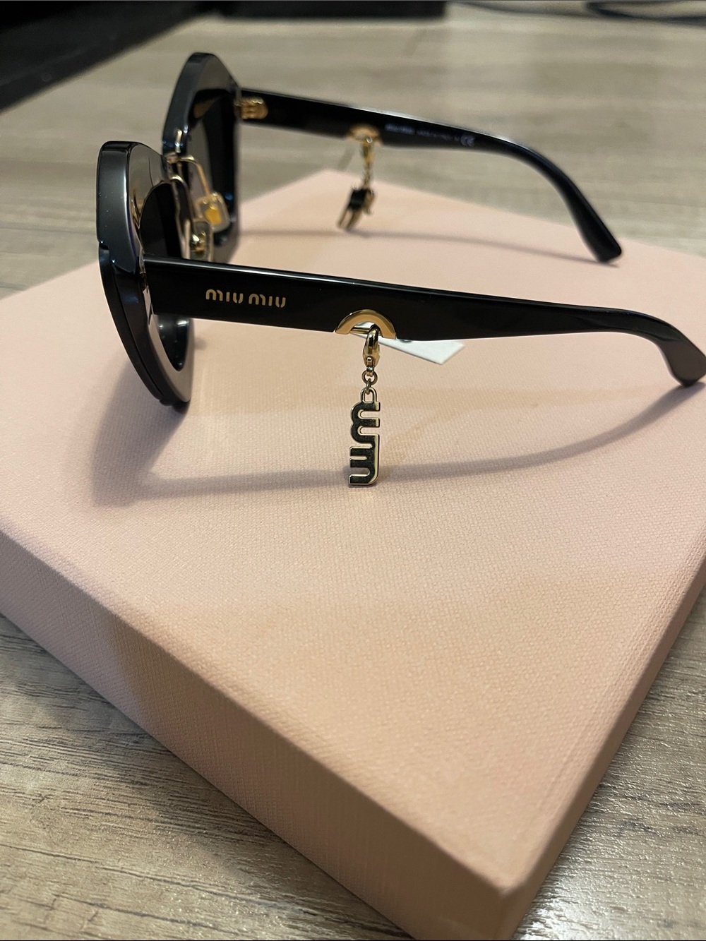 Miu Miu Black  Cat-Eye Sunglasses with Dark Lenses